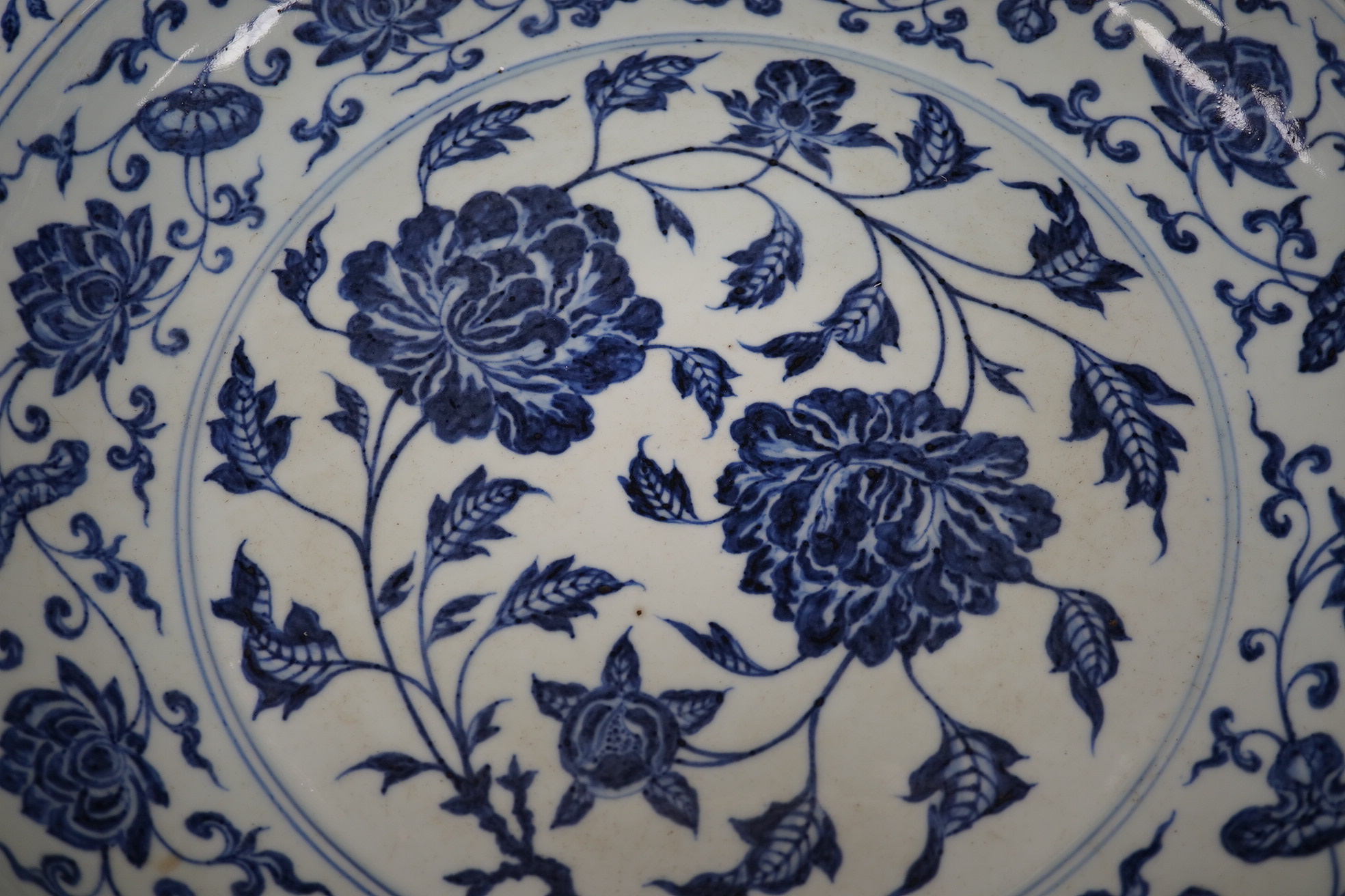 A large Chinese Ming style blue and white dish, possibly 18th century